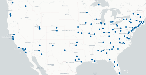Map of the United States with blue dots scattered across. The dots are more dense in the Eastern half, with a noticeable pattern of dots along a line from Washington D.C. to Boston.